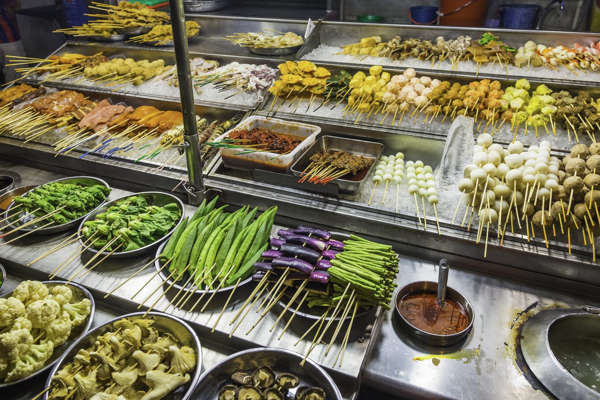 Delicious street food on night market stall Kuala Lumpur Malaysia